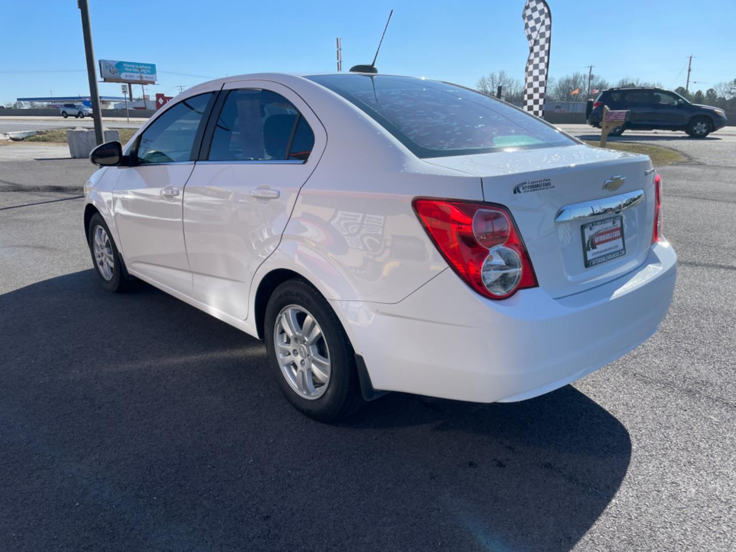 2016 White Chevrolet Sonic (1G1JC5SHXG4) with an 4-Cyl, 1.8 Liter engine, Automatic, 6-Spd transmission, located at 8008 Warden Rd, Sherwood, AR, 72120, (501) 801-6100, 34.830078, -92.186684 - Photo#5